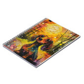 かわいいファンシーなダックスフンドの子犬が森で ノートブック (左側)