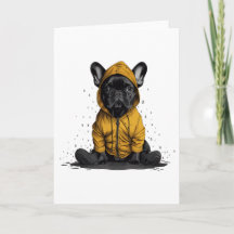 かわいいフランスのブルドッグがレインコートを着る