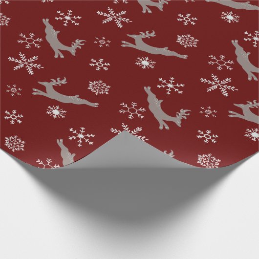 かわいいブルゴーニュ飛んでいるートナカイ雪のクリスマス ラッピングペーパー (角)