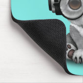 かわいいベビーのコアラの身に着けているヘッドホーン マウスパッド (コーナー)