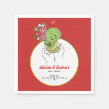 かわいいベビーのヘビが赤い赤ちゃんシャワーの途中にある