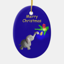 かわいいベビー象は蝋燭のクリスマスをつけます