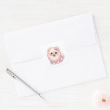 かわいいポメラニアンの仔犬の紫色のリボンのパステルカラー