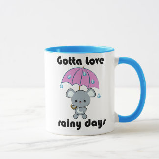 かわいいマウスおよび傘の雨の日のマグ マグカップ