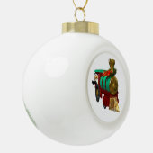 かわいいマンガペンギンとクリスマストレイン セラミックボールオーナメント (左)