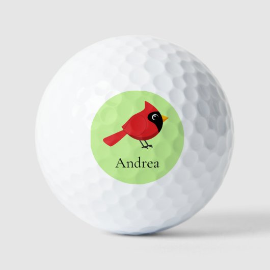 かわいいマンガ赤い(鳥)ショウジョウコウカンチョウと花 ゴルフボール (正面)