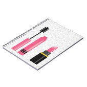 かわいいメイクアップピンクの口紅とマスカラ ノートブック (左側)