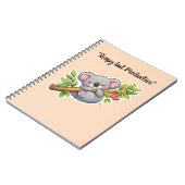かわいいユーカリの枝で寝るコアラのキャラクター ノートブック (左側)