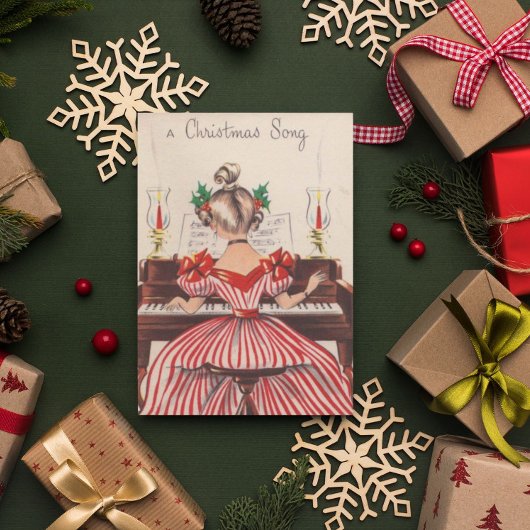 かわいいヴィンテージクリスマスソングの女の子のピアノ ポストカード