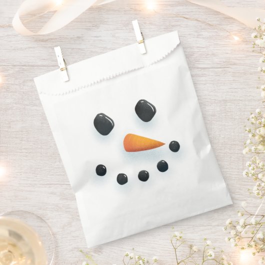かわいい図解入りの、写真付きの雪だるま顔クリスマス フェイバーバッグ (クリップ留めされた状態)