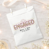 かわいい婚約パーティーのお知らせ 追加 名前 日付 フェイバーバッグ (クリップ留めされた状態)