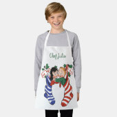 かわいい子ども連れのヴィンテージクリスマスストッキング エプロン (着用した状態)