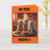 かわいい子犬たちがハロウィンのお菓子を選ぶ カード (黄色い花)