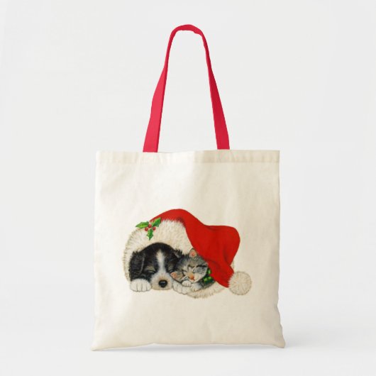 かわいい子犬と子猫がサンタハットで寝る トートバッグ (正面)