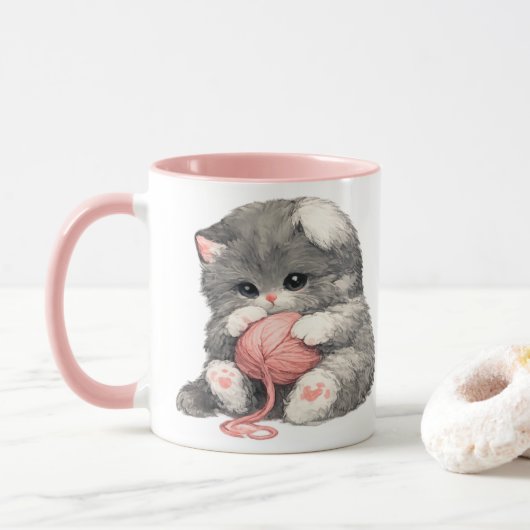 かわいい子猫とピンクの毛糸のマグカップ マグカップ (ドーナツ)