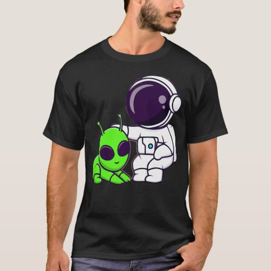 かわいい宇宙飛行士遊がエイリアン漫画を持つ Tシャツ (正面)