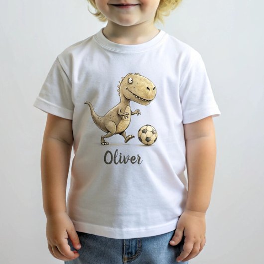 かわいい小さなトレックス遊のフットボール ベビーTシャツ