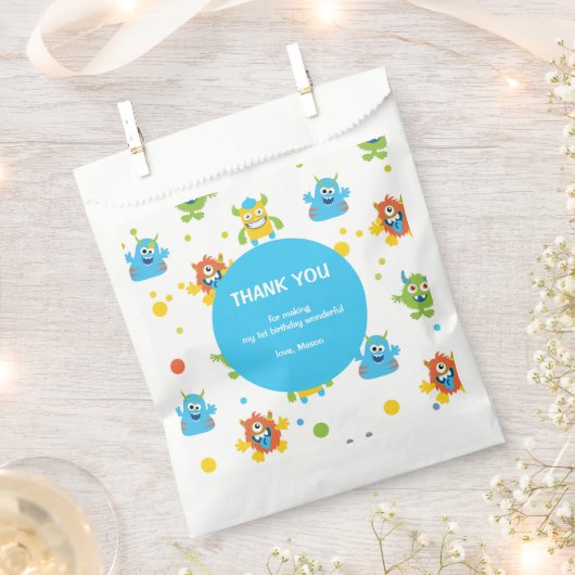 かわいい小さなモンスターをテーマにした誕生日パーティー フェイバーバッグ (クリップ留めされた状態)