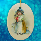 かわいい小さなヴィンテージの女の子のホールディングドールライトタン セラミックオーナメント