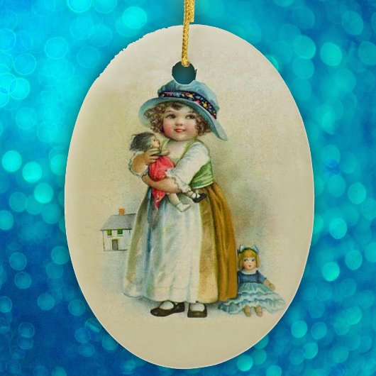 かわいい小さなヴィンテージの女の子のホールディングドールライトタン セラミックオーナメント