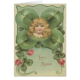 かわいい小さな女の子4葉クローバー花