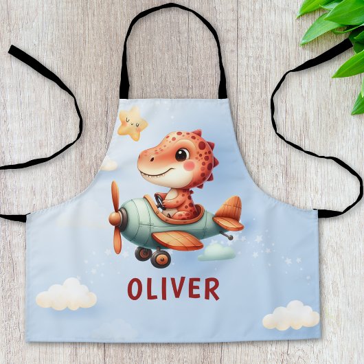 かわいい小パイロット恐竜飛んでいる飛行機 エプロン