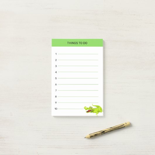 かわいい幸せなワニの物事を緑と白で ポストイット (デスク上)