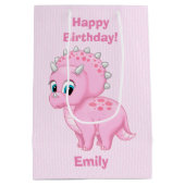 かわいい明るいピンクのトリケラトプスの恐竜 ミディアムペーパーバッグ (裏面)