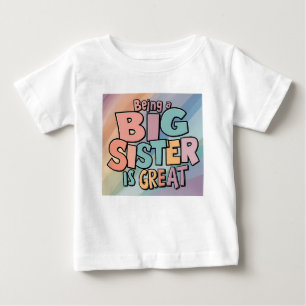 かわいい楽しいカラフルな姉になるのは最高! ベビーTシャツ
