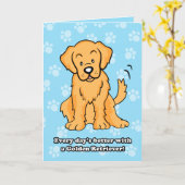 かわいい漫画のゴールデン・リトリーバーの挨拶状 カード (黄色い花)