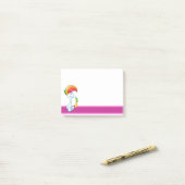 かわいい漫画のユニコーンそれをポスト ポストイット (デスク上)