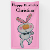 かわいい漫画の白いバニーはかわいらしいピンクの上で手早くめくります 横断幕 (縦)