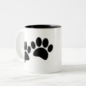 かわいい漫画の黒い子犬の前絵 ツートーンマグカップ (正面左)