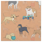 かわいい犬のパターンデザインオレンジ ファブリック (クローズアップ)