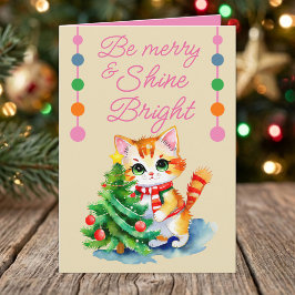 かわいい猫とクリスマスツリーのメリークリームピンク シーズンカード