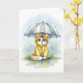 かわいい猫のレインコートと傘の水彩画 カード (黄色い花)