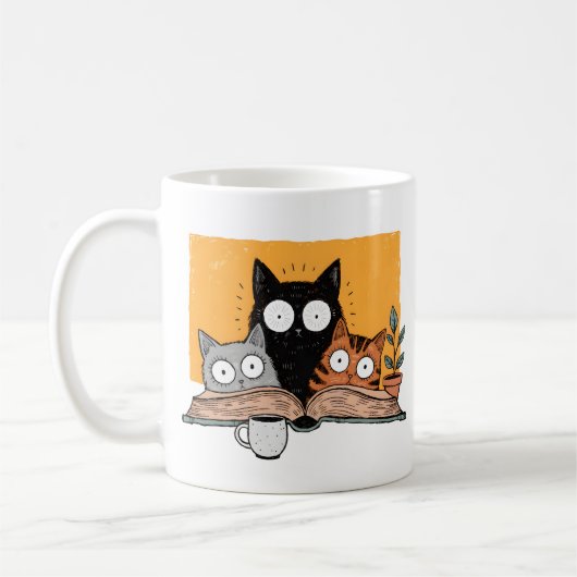 かわいい猫の読書イラスト コーヒーマグカップ (左)