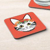 かわいい猫の顔の鮮やかなイラスト コースター (左側)
