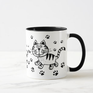 かわいい猫及び足のプリントのマグ マグカップ