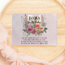 かわいい童話へ本を持ってベビー