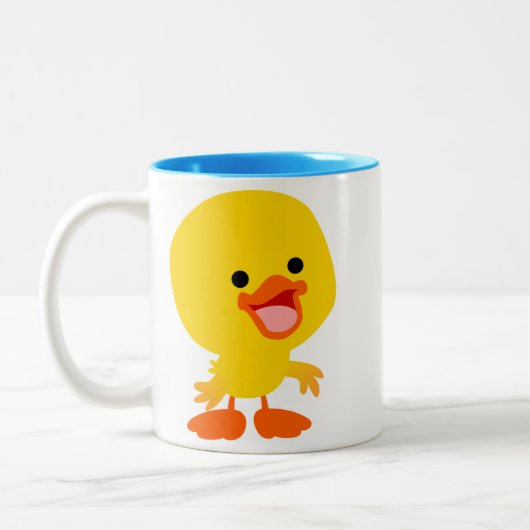 かわいい笑顔の漫画アヒルのマグカップ ツートーンマグカップ (左)