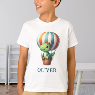 かわいい緑の恐竜が熱気球で飛び立つ Tシャツ