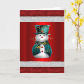かわいい緑の雪だるまが赤いクリスマスにいる カード (黄色い花)