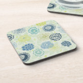 かわいい花が付いているスタイリッシュな花パターン コースター (左側)