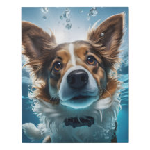 かわいい茶色と白い犬の水中スイミング