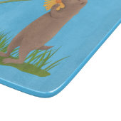 かわいい草原の犬が花漫画を嗅ぐ カッティングボード (角)