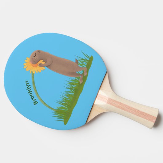 かわいい草原の犬が花漫画を嗅ぐ 卓球ラケット (横)