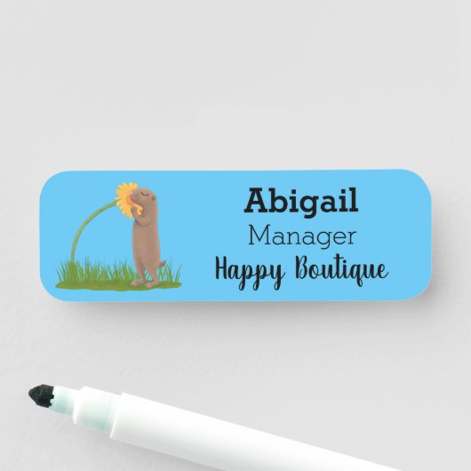 かわいい草原の犬が花漫画を嗅ぐ 名札 (インサイチュ)