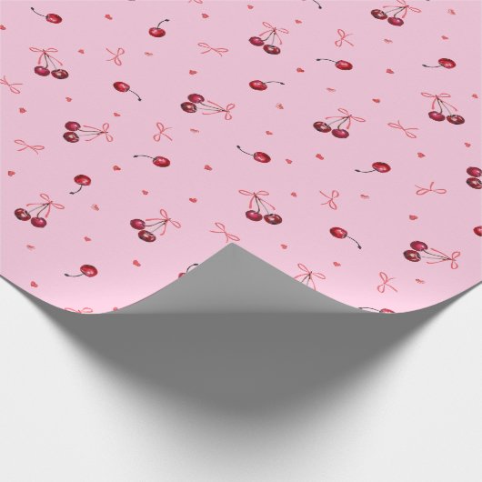 かわいい赤いさくらんぼのハートがピンクで弓 ラッピングペーパー (角)