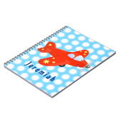 かわいい赤い飛行機飛んでいる漫画イラストレーション ノートブック (左側)